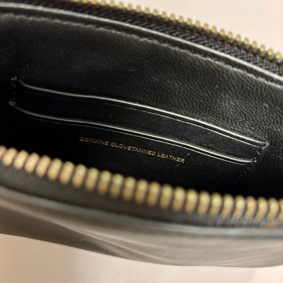 Black leather Coach wristlet with embossed Tyrannosaurus Rex - Picture 5 of 5